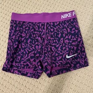 nike pros size medium purple and dark blue pattern